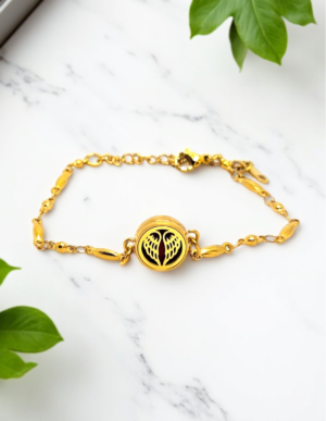 pulseira de aromaterapia Asa Dourada em aço inoxidável com difusor de óleos essenciais