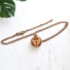 Colar difusor de óleos essenciais asas de anjo rose gold